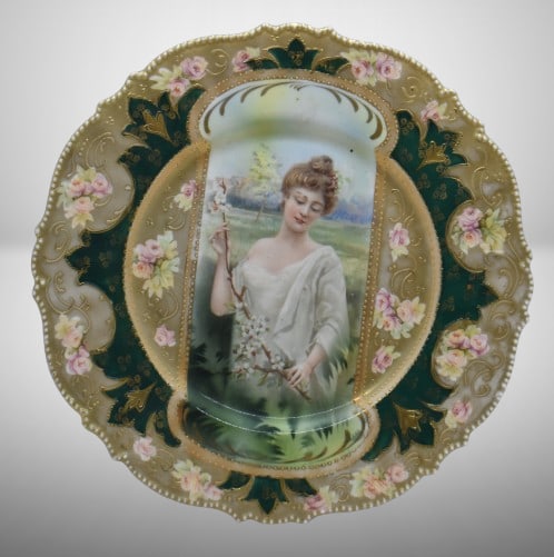 R.S. Prussia Mold 343 9.5"d cake plate, Spring season portrait in keyhole medallion, red mark: R.S. Prussia Mold 343 9.5"d cake plate, Spring season portrait in keyhole medallion, red mark; nice gold and green border finish