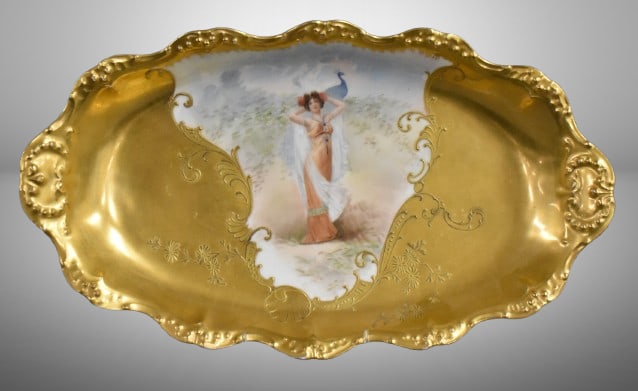 Mrkd. Limoges (France) 16"l x 9"w oval bowl featuring Lady w/ Peacock: Mrkd. Limoges (France) 16"l x 9"w oval bowl featuring Lady w/ Peacock; heavy gold