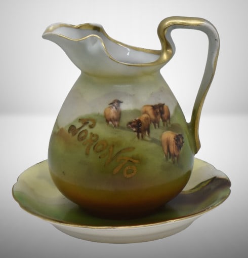 Royal Bayreuth souvenir 3.5"h creamer and 4.25"d underplate, Highland Sheep, blue mark: Royal Bayreuth souvenir 3.5"h creamer and 4.25"d underplate, Highland Sheep, blue mark;