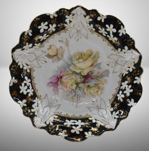 Unm. porcelain 10.25"d bowl, soft yellow roses/ black border w/ scattered white flowers, circle mold: Unm. porcelain 10.25"d bowl, soft yellow roses/ black border w/ scattered white flowers, circle mold mark;