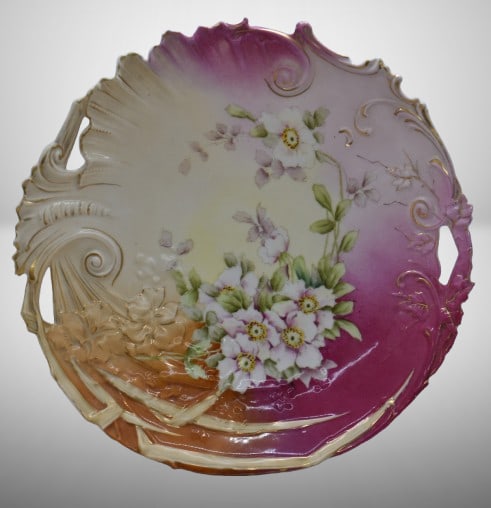 R.S. Prussia 12"d charger, white open blossoms, circle mold mark: R.S. Prussia 12"d charger, white open blossoms, circle mold mark; ornately scrolled border