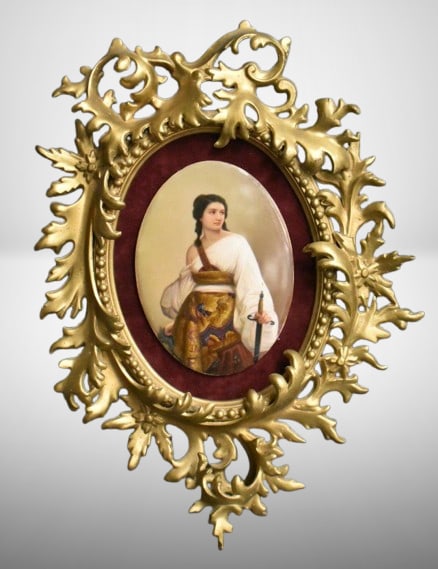 KPM oval porcelain plaque "Judith" mounted on brass framework: KPM oval porcelain plaque "Judith" mounted on brass framework; plaque measures 6"h x 4.5"w, overall size is 15"t