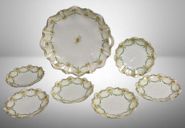R.S. Prussia 7 pc. cake set, daisy-like flowers, red mark: R.S. Prussia 7 pc. cake set, daisy-like flowers, red mark; 11"d master and 6.25"d individuals