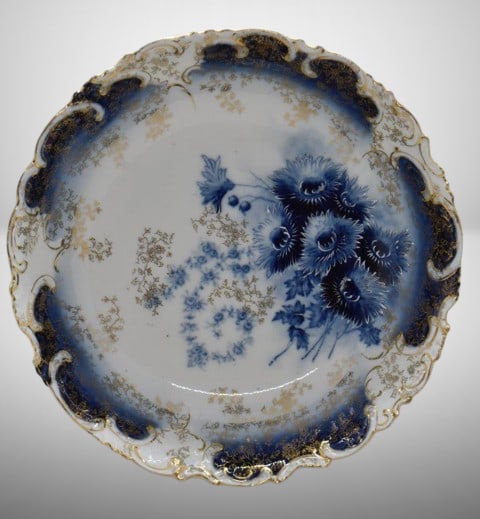 Handpainted porcelain 10"d cobalt bowl w/ blue flowers: Handpainted porcelain 10"d cobalt bowl w/ blue flowers; gold stenciling