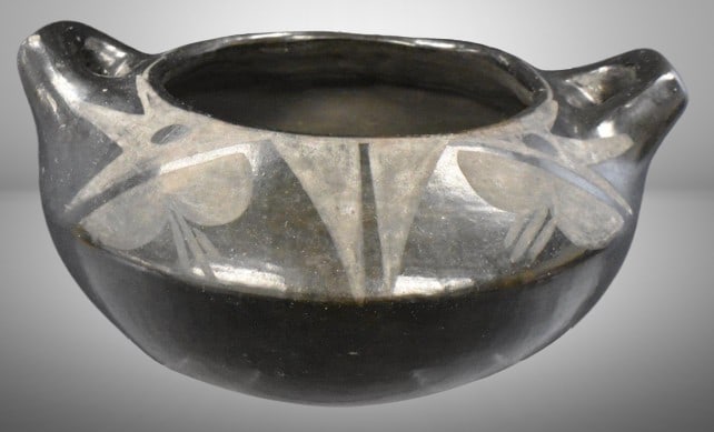 Native American black on black pottery handled bowl: Native American black on black pottery handled bowl ; 5"h x 9"d at widest part