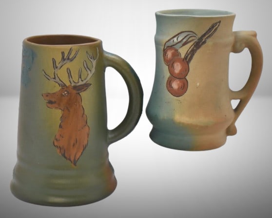 (2) Mrkd. Weller mugs: 5.75" Dickensware, stag; 5" Floretta, cherries (1 of 13)