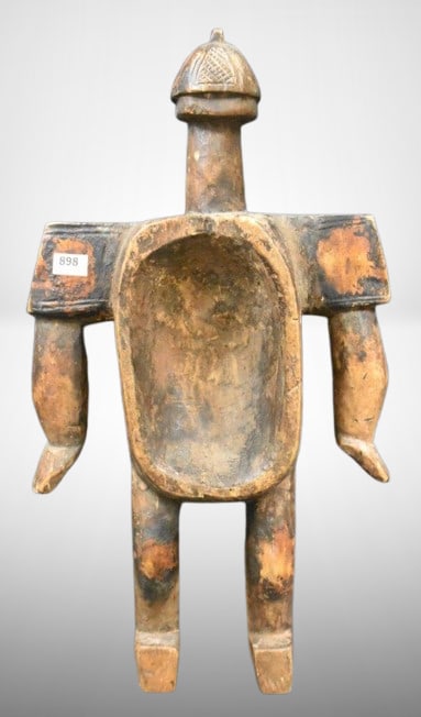Unusual handcarved wooden 17"h African KORO tribal statue: Unusual handcarved wooden 17"h African tribal statue;Container used for pouring libations - great patina/wear to attest to age!