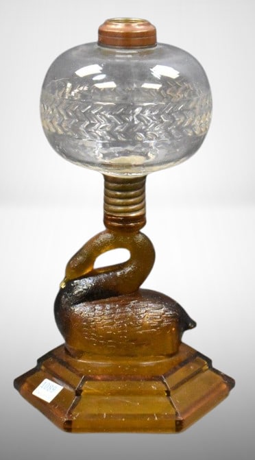 Atterbury amber figural swan stem kerosene lamp, 9"h (1 of 10)