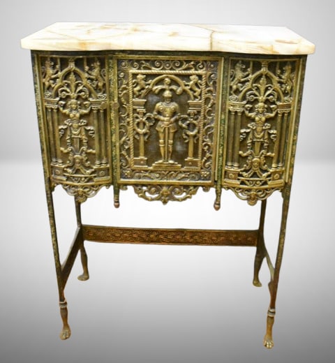 Marble top bronze entry cabinet, bronze work features standing figures, lions and faces, all against (1 of 17)