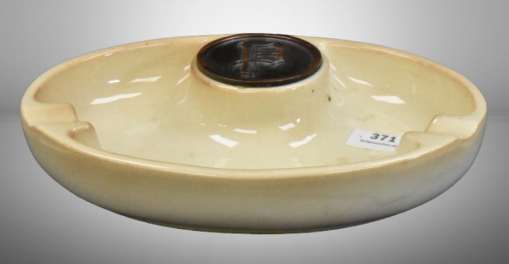 Roseville "The Hyde Park" No. 1950 cream colored ashtray; monogram P. Please use pictures as part: Roseville "The Hyde Park" No. 1950 cream colored ashtray; monogram P. Please use pictures as part of the description. Brown Auction attempts to call any flaw that can affect the value of each piece. I