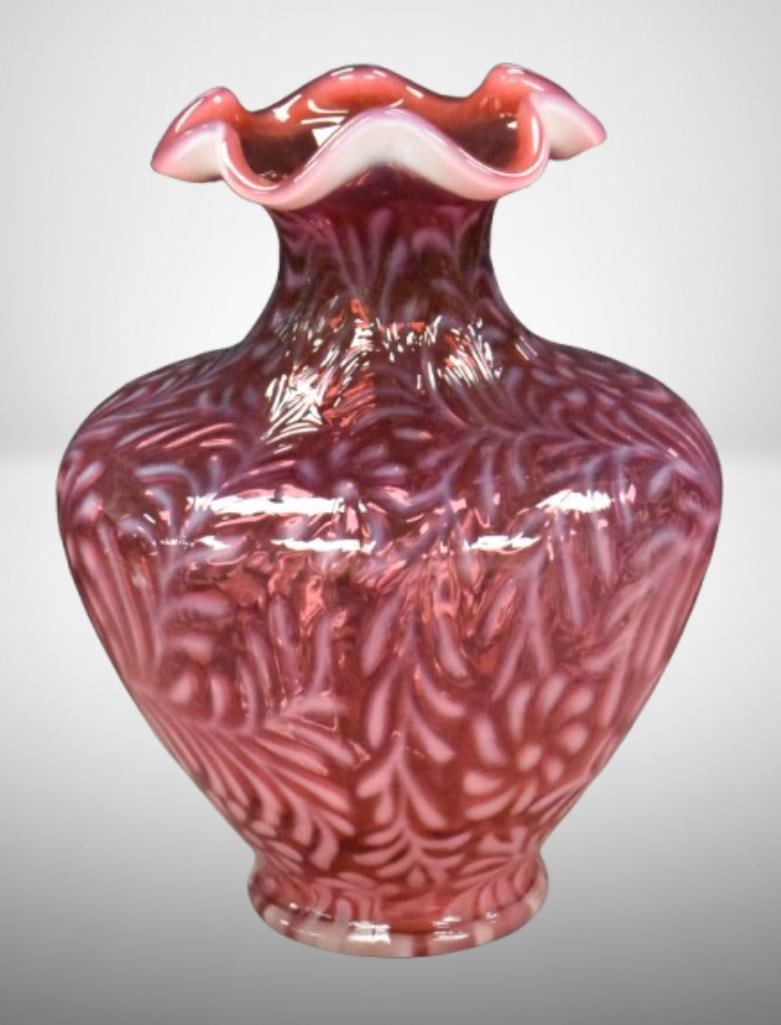 Fenton Cranberry opalescent Daisy and Fern ruffled rim 11.25" vase: Fenton Cranberry opalescent Daisy and Fern ruffled rim 11.25" vase; . Please use pictures as part of the description. Brown Auction attempts to call any flaw that can affect the value of each piece. I