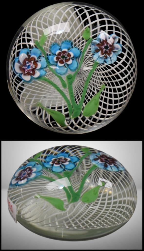Paperweight featuring bouquet of blue flowers on white latticinio ground: Paperweight featuring bouquet of blue flowers on white latticinio ground; 2.25" tall. Please use pictures as part of the description. Brown Auction attempts to call any flaw that can affect the value