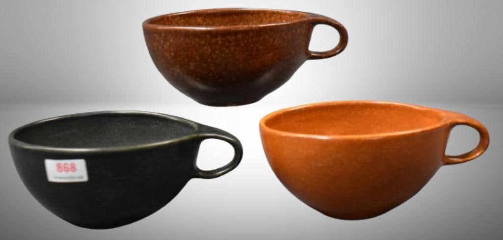 (3) Roseville Raymor 150 cups, green: brown, dark tan, black: (3) Roseville Raymor 150 cups, green: brown, dark tan, black; . Please use pictures as part of the description. Brown Auction attempts to call any flaw that can affect the value of each piece. It is t