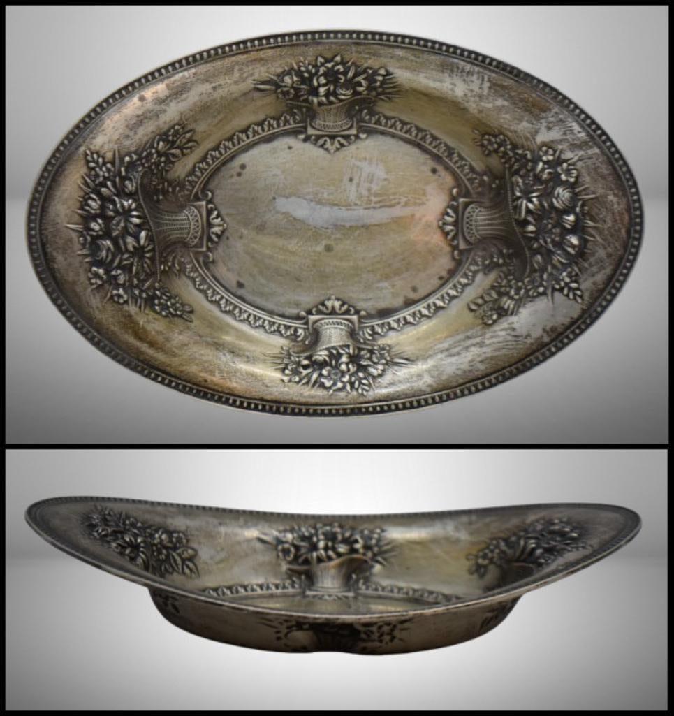 Mrkd. Sterling #1058 7" receiving/ trinket dish: Mrkd. Sterling #1058 7" receiving/ trinket dish; embossed baskets of flowers design, 91 grams; Items as pictured