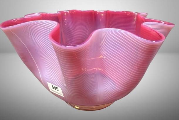 Pink Cased Glass Lamp Shade with Drapery Design: Pink cased glass lamp shade featuring an opalescent Drapery design. Measures 5" ? tall, with a 4-inch base diameter and 8-inch top diameter. A visually unique and functional piece for lighting decor.