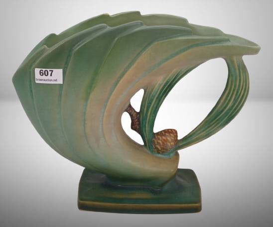 Roseville Pine Cone 472-6" Vase, Green: Roseville Pine Cone vase in green, model 472-6". Features raised pine cone and needle motif. Includes factory flaw under clear glaze on the top rim. Marked on the base. Approximate height 6 inches.