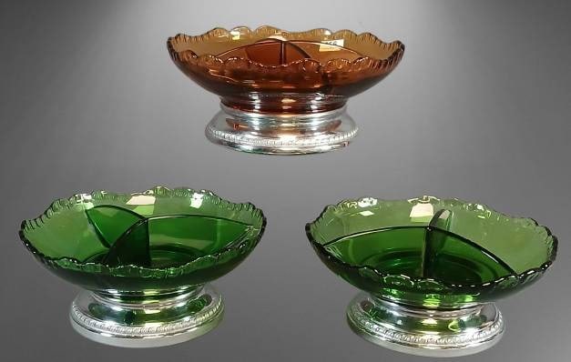 Farber Bros Krome Kraft Divided Glass Dishes: Three divided glass serving dishes by Farber Bros, featuring scalloped edges and mounted on silver-plated Krome Kraft bases. Includes one amber dish and two green dishes. Each dish is marked on the ba