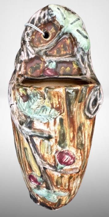 Weller Warwick Wall Pocket: Weller pottery Warwick 11.5" wall pocket featuring a multi-colored relief design. Marked on the back with Weller Pottery logo. Shows overall crazing. Includes dimensions as noted in the image scale.
