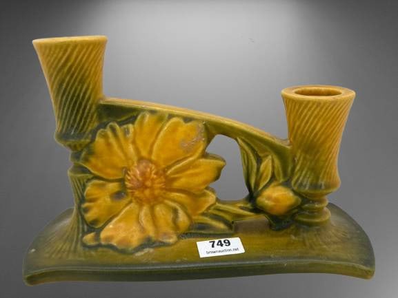 Roseville Peony 1153 Yellow Candleholder: Roseville Pottery Peony pattern double candleholder, featuring a vibrant yellow floral design against a green base. Marked "Roseville U.S.A. 1153" on the base. Appears to be in good condition. ?