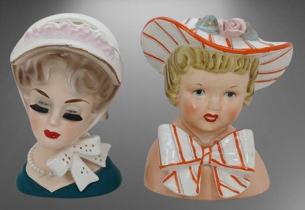 (2) Lady Head Vases ?: Two ceramic head vases, 1-by Relpo. Both feature hand-painted details, one with a pink hat and pearls, and the other with a striped bonnet and bow. Slight wear consistent with age, no visible cracks o