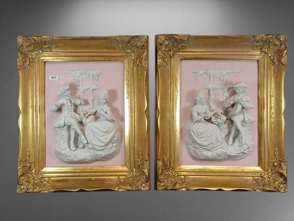 Framed Porcelain Plaques: Porcelain plaques depicting Rococo pastoral scenes from the Castle Park of Sanssouci (circa 1750-1760). Marked "Alt Meissen Art." Both plaques are in gold-painted ornate frames. One statue has a broke