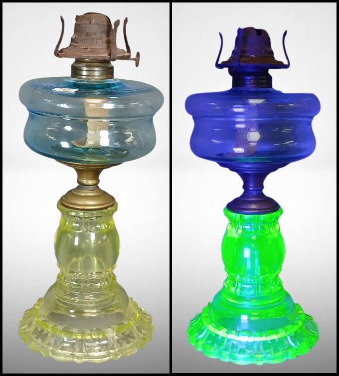 Blue and Vaseline Glass Oil Lamp: A blue and vaseline glass oil lamp with a brass connector and metal burner. The vaseline glass base fluoresces under UV light. Noted chips and cracks are present at the base, as shown in the photos. A