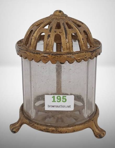 Arcade Cast Iron and Crystal Bank, 4" Tall: Arcade cast iron and crystal bank featuring a domed, lattice-style top and sturdy base. Measures 4 inches in height. A collectible piece showcasing vintage craftsmanship with visible wear consistent w