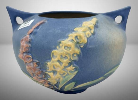 Roseville Blue Foxglove 418-4" Bowl, Blue: Roseville Foxglove 418-4" blue bowl featuring floral motifs. Small chip on bottom rim. In-house shipping available.