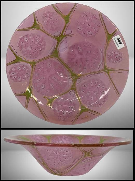 1960's Higgins Art Glass Bowl: Signed Higgins Art Glass 8"d bowl from the 1960s, featuring a pink floral design with green accent stems. Showcases craftsmanship typical of the artist's work during this period. No chips, cracks or r