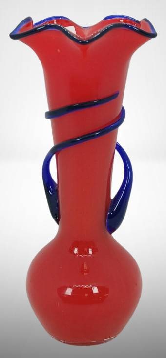 Mrkd. Czechoslovakia 7.5" Red and Cobalt Vase: Mrkd. Czechoslovakia red glass vase with cobalt serpentine detailing and handles, 7.5 inches tall. No chips, cracks, or repairs. In-house shipping available.