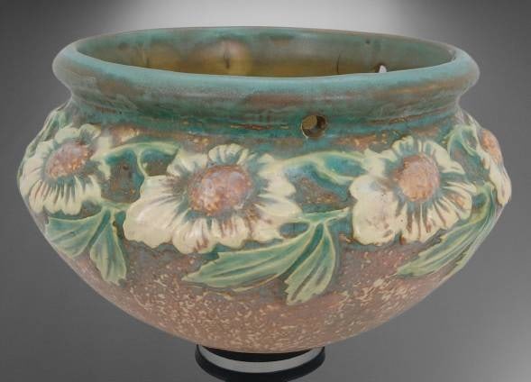 Roseville Dahlrose 343-6" Hanging Basket: Roseville Dahlrose 343-6" hanging basket featuring a floral design in earthy tones with green accents. Includes chain for hanging. Appears to be in well-preserved condition with no visible cracks or r