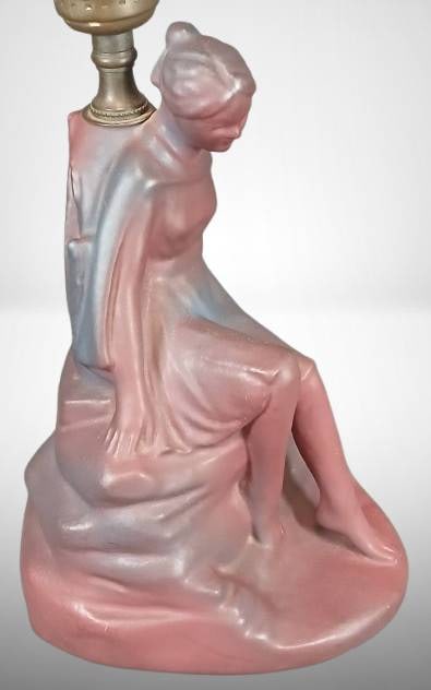 Van Briggle Nellie Walker ??Daydreamer' Lamp: Van Briggle "Daydreamer" mulberry lamp designed by Nellie Walker. No chips, cracks, or repairs. Features a detailed sculpture in shades of mulberry. Includes harp and socket hardware. 18" tall to top