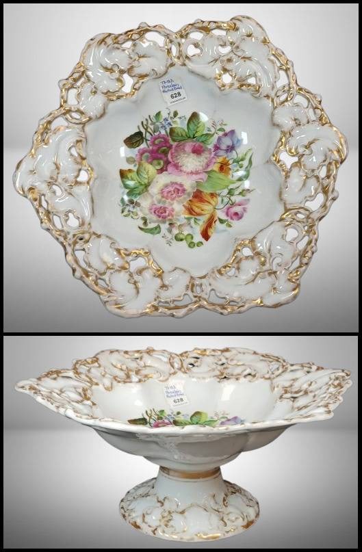 TMM Porcelain Pedestal Compote Bowl: Mrkd. TMM porcelain pedestal compote bowl featuring floral decoration and gilt accents. Decorative design with intricate detailing throughout. Measures 6"h x 13"d. No chips, cracks or repairs. In-hous