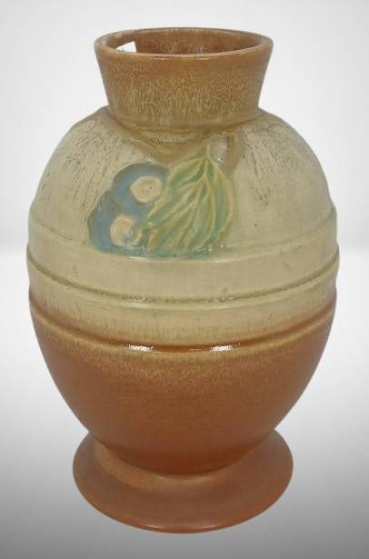 Roseville Futura 428-8" "Egg with Leaves" vase: Roseville Futura "Egg with Leaves" 8" vase in excellent condition with no chips, cracks, or repairs. Featuring a two-toned design with delicate floral accents, this collectible piece is from the Futur