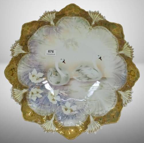 Handpainted Porcelain Bowl with Swans: Unm. RSP handpainted porcelain bowl featuring swans and floral decoration. Gold-toned scalloped rim adds intricate detail. No chips, cracks, or repairs noted. Measures approximately 10" in diameter. I