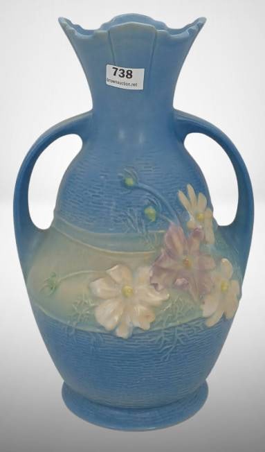 Roseville Cosmos Blue 952-9" Vase: Roseville Cosmos 952-9" vase in a blue finish. Features floral motifs and dual handles. Marked on the bottom. No chips, cracks, or repairs. In-house shipping available.