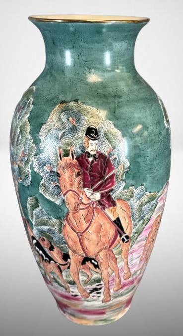 Chinese-Style Decorative Hunting Scene Vase: This decorative vase features vibrant depictions of a hunting scene with riders, horses, and hounds set against a wooded backdrop. It measures approximately 15" tall and bears Chinese-style markings o
