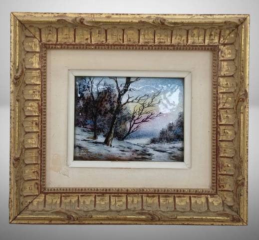 Limoges Winter Scene Framed Painting: This hand-painted Limoges depiction of a winter landscape is framed in an ornate wood frame with gilded accents. The intricate brushwork highlights the serene scenery. Measures 7" x 6.25". Signed "Sal