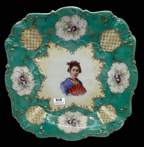 Hand-Painted Porcelain Plate w/ Portrait: Decorative hand-painted square-shaped porcelain plate featuring a central portrait of an Oriental lady with a red fan, intricate gold detailing, floral motifs, and a turquoise background. Measures app