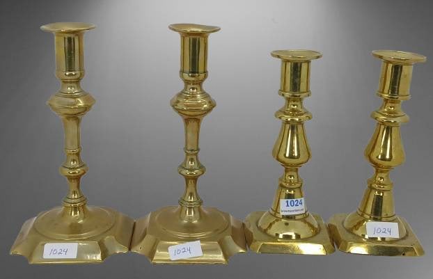 (2) Pr. Brass Candlesticks: (2) Pr. of brass candlesticks with varying designs and all featuring a polished finish. Each pair has unique styling on the stem and varying base shapes. Measuring 6" and 8". Bases show some patina an