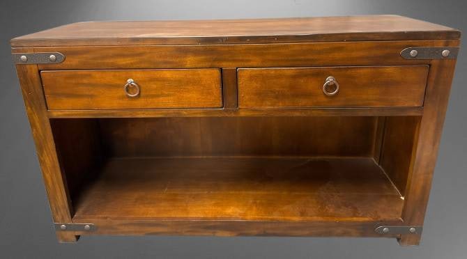 Modern Wooden Console Table With Drawers: This modern furniture piece measures 28" tall, 48" wide, and 16" deep. It features two drawers with metal ring pulls and an open lower shelf for added storage in a rich wood finish. BROWN AUCTION WILL