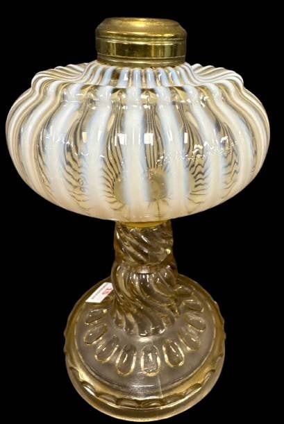 Stripe Opalescent Kerosene Stand Lamp Base: A glass oil lamp base featuring opalescent stripes of white and amber, set with a brass collar. This elegant piece displays intricate detailing on the base and stem, measuring approximately 7" in heig