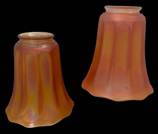 NuArt Carnival Glass Lamp Shades: This pair of mrkd. NuArt Carnival Glass lamp shades showcases a rich, iridescent marigold finish and original scalloped design. Both shades are in excellent condition with no chips, cracks, or repairs