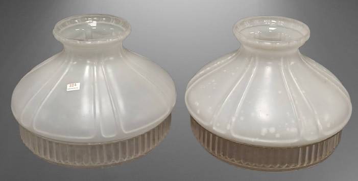 (2) Aladdin No. 12 Glass Lamp Shades: (2) Satin white Aladdin 12 glass lamp shades with ribbed and grooved detailing. Each shade features a wide, flared top opening and a ribbed bottom rim, giving a classic design to fit a variety of fixt