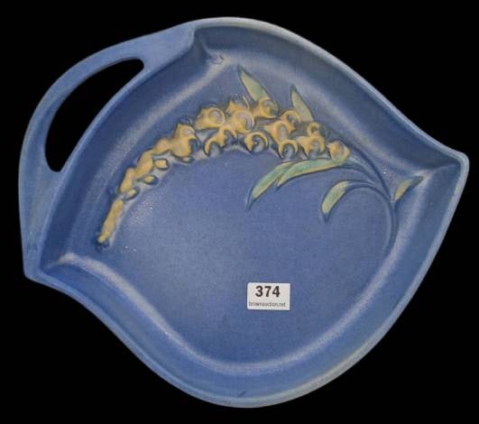 Roseville Foxglove 419-8" Tray in Blue: This Roseville Foxglove 419-8" tray features a striking blue color and a delicate floral motif. It is free from chips, cracks, or repairs. A fine example of Roseville craftsmanship. In-house shipping 
