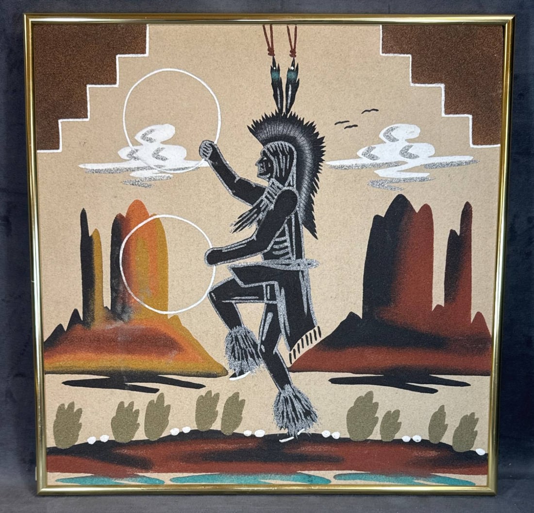 16" x 16" Sand Art in Gold Frame: 16" x 16" Sand Art titled 'Hoop Dance,' created with all-natural sands and colored rocks by the artist. The piece includes a gold-tone frame. In-house shipping available.
