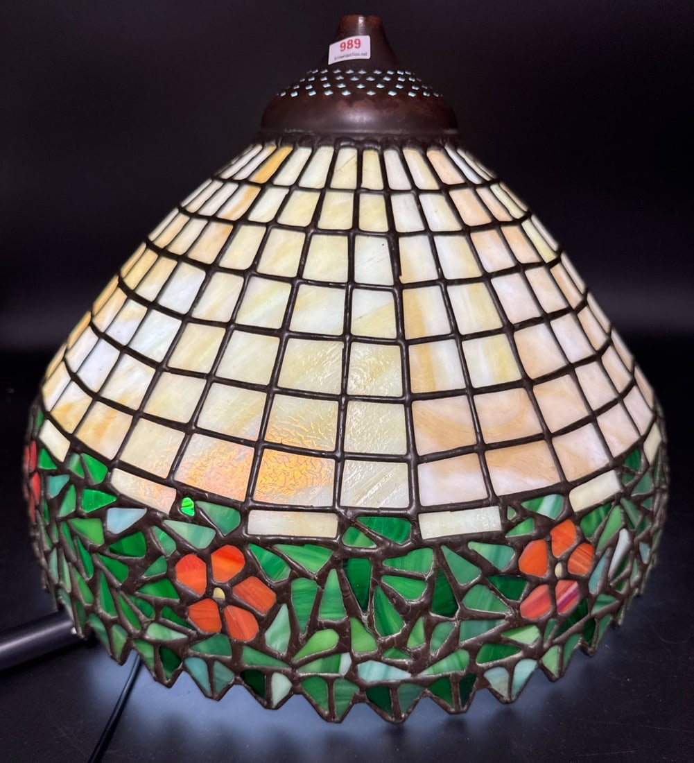 Stained Glass Lamp Shade, 16.5" Diameter: Stained glass lamp shade with floral and geometric patterns featuring multicolored pieces in orange, green, and white tones. Measures 16.5" in diameter. Panels all appear intact with no damage. In-hou