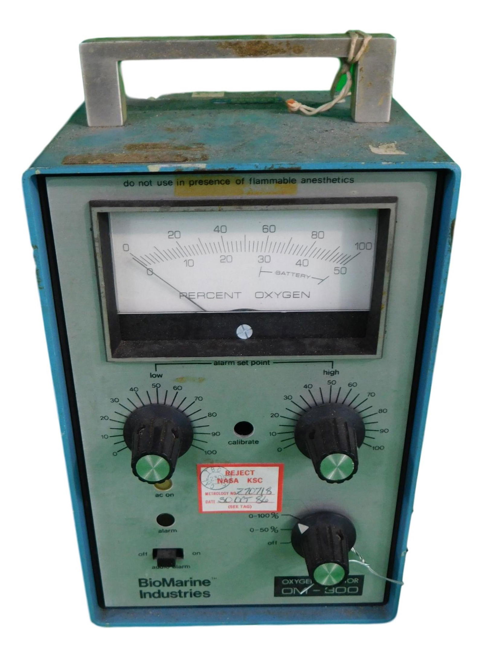 NASA Space Shuttle item: NASA Space Shuttle item Oxygen Monitor Made by Biomarine Industries Part No. Model OM-300 piece is 8" by 5 1/4" by 4 1/2" All items from the state of Charles Bell space auction in May of 2000All item