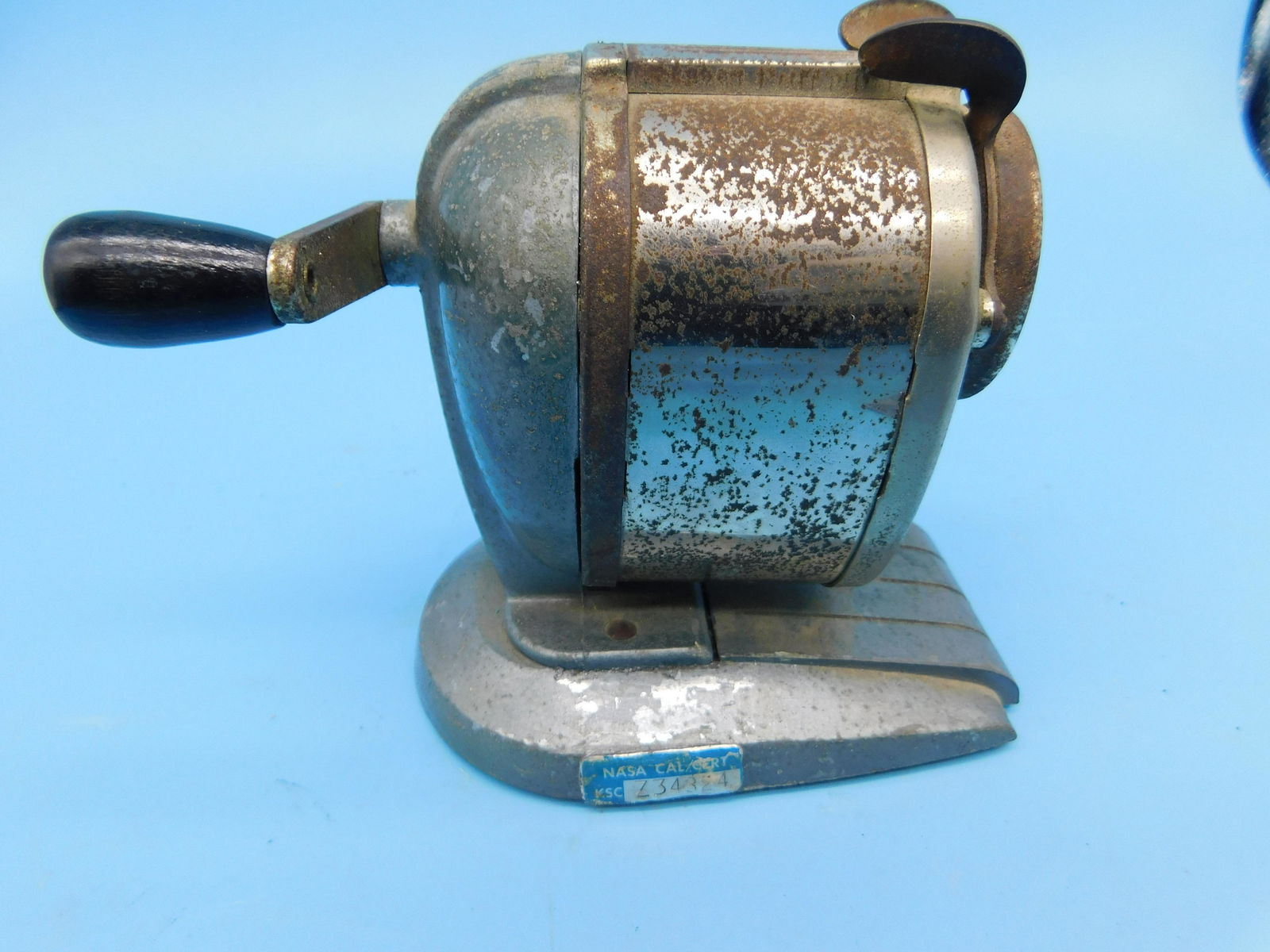 RARE NASA USED PENCIL SHARPENER: RARE NASA USED PENCIL SHARPENER NASA TAG. All items from the Estate of Charles Bell space auction in May of 2000. This Auction is located in Orlando Florida Warehouse. For shipping Call Today for quot