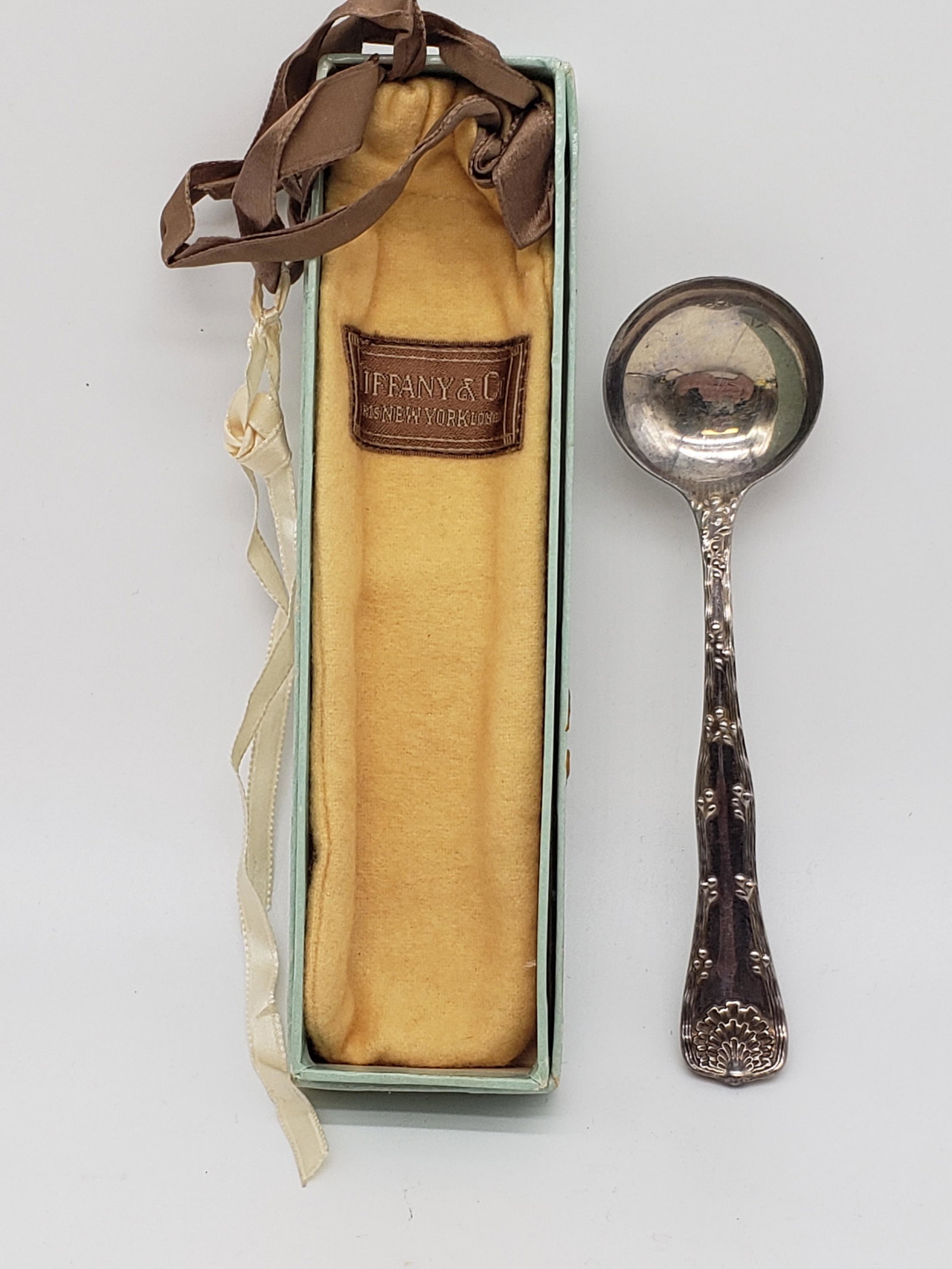 ANTIQUE TIFFANY STERLING SILVER PORRIDGE SPOON: Antique Tiffany Sterling Silver Porridge Spoon Piece is 5 3/8" x 1 7/8" Weight is 41.2 Grams All item for this Auction Located in in Hollywood Florida Warehouse For Shipping Call today for quote they 
